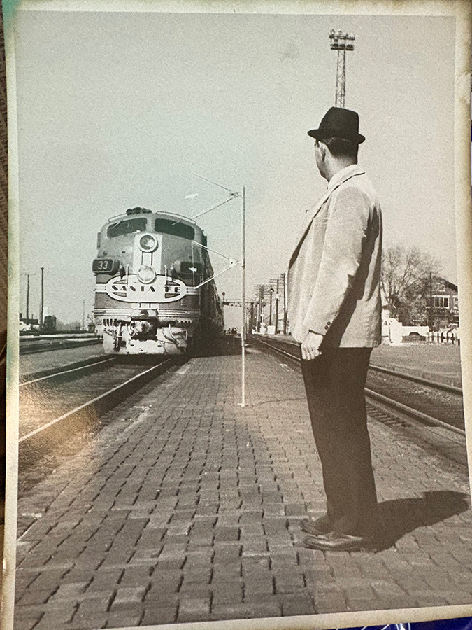 George McGinnis on the platform in Emporia, Kansas, waiting for the last Santa Fe streamliner to run through Emporia George McGinnis on the platform in Emporia, Kansas, waiting for the last Santa Fe streamliner to run through Emporia