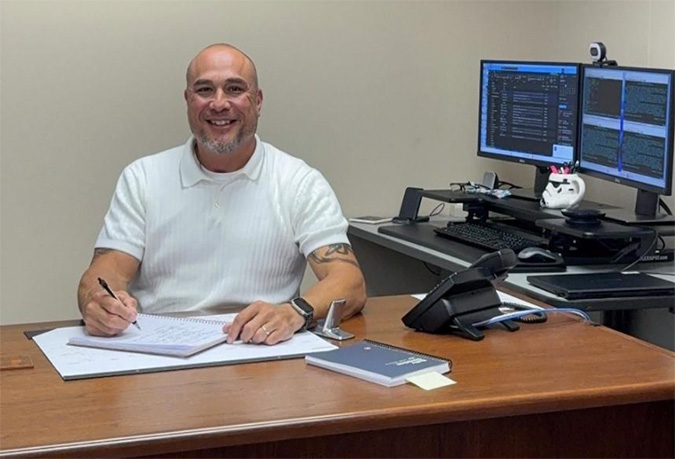 Wong at his desk in Topeka Wong at his desk in Topeka